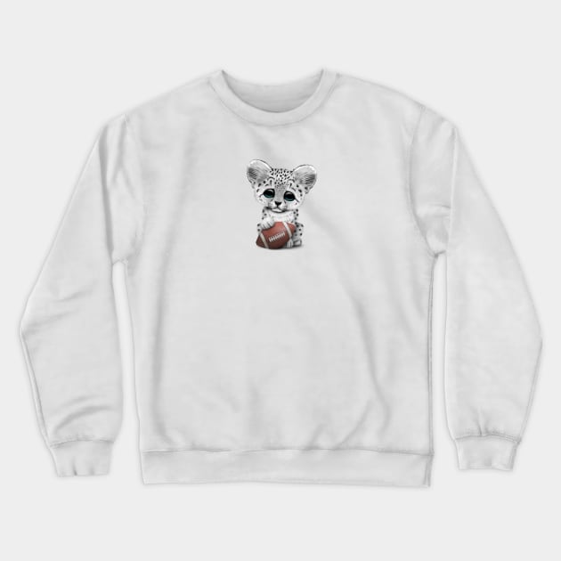 Snow Leopard Cub Playing With Football Crewneck Sweatshirt by jeffbartels